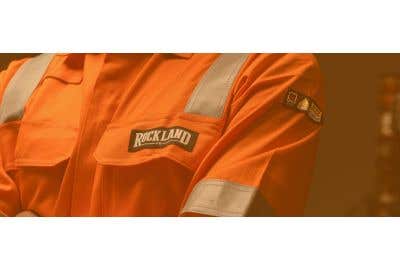 Coveralls with Rockland logo on the  chest and a arc-rated badge on the sleeve