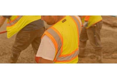 Construction workers wearing vests that say Rockland on the back