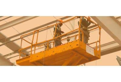 Two workers on a scissor lift 